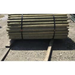 Pointed drive treated wood posts.