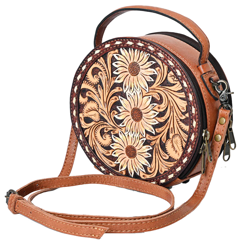 Front of the American Darling Sunflower Tooled Canteen Purse featuring a Western Tooled design with three sunflowers down the middle. Has a shoulder strap in matching leather as well as a hand held strap. Two zippers line the two edges of the cylinder shape to make the two main compartments.