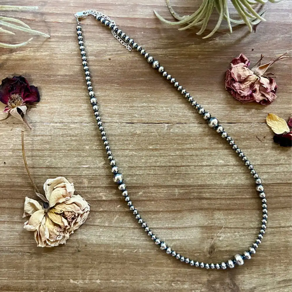 Graduated sterling silver beaded necklace โ 18-inch adjustable design