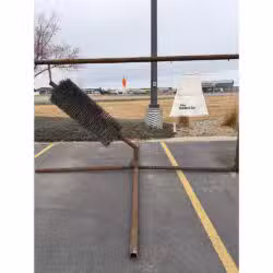 45 degree cattle scratching brush.